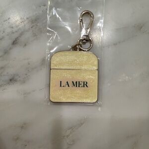 La Mer Cream and Silver Keychain